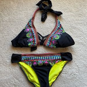 Trina Turk two piece halter size 4.  Excellent condition.